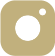 Instagram logo in gold color.